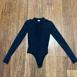Aritzia black key hole body suit.